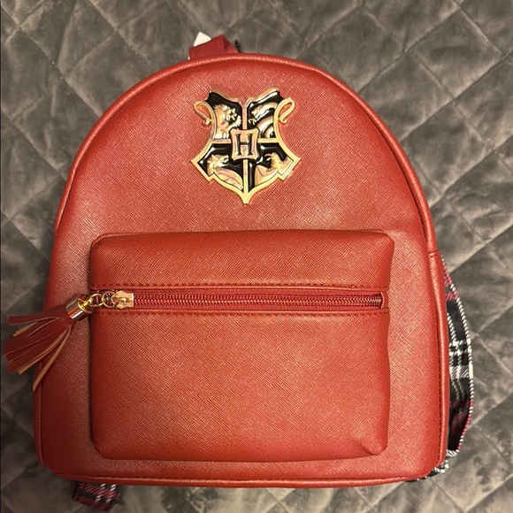 Warner Bros. Handbags - NWT Harry Potter Mini Backpack with Hogwarts Crest